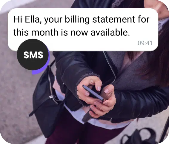 Girl on the street receiving a billing statement via SMS